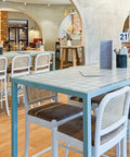 Sienna Stools In White With Tiled Bar Tables At The Rezz Hotel 