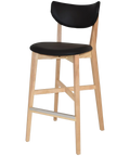 Romano Bar Stool With Natural Frame And Black Vinyl Seat And Back, Viewed From Angle In Front