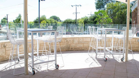 Squire Table Base On Castors Compact Laminate Table Top And Jett Stools In The Outdoor Dining Area At Murray Bridge Hotel