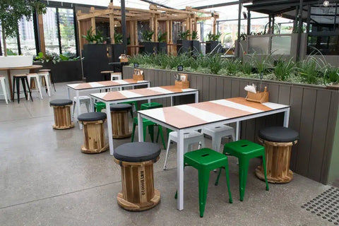 Titus Stools And Custom Compact Laminate Table Tops On Henley Table Base At The Gully Public House & Garden