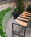 Jet Bar Stools and Custom Compact Laminate Table Tops On A Henley Table Base At The Gully Public House & Garden