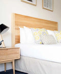 Black Miley Bedside Lamp With Custom Valance And Cushions At The Manna Of Hahndorf