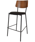 Venice Bar Stool With Black Frame And Black Vinyl Seat With Light Walnut Backrest, Viewed From Angle In Front
