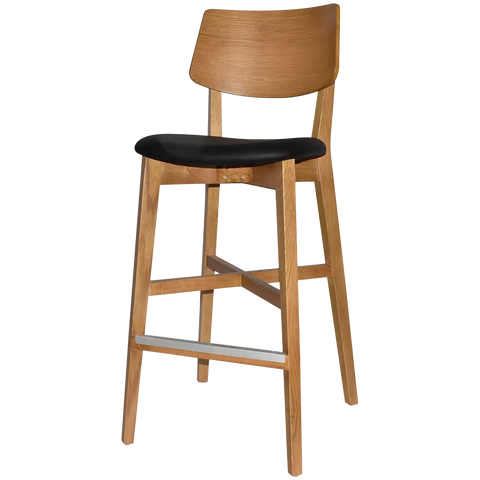 Vinnix Bar Stool With Light Oak Timber Frame And Black Vinyl Upholstered Seat, Viewed From Angle In Front