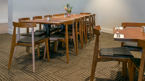 Zoltan Chairs And Walnut Rustic Timber Table Tops At The Bridgeway Hotel