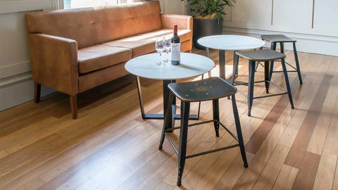 Lyla Table Base With Compact Laminate Table Tops And Coleman Low Stools At Robin Hood Hotel