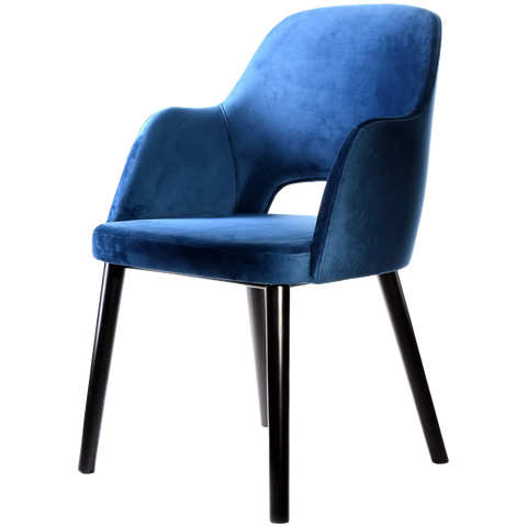 Alfi Armchair With Denim Velvet Shell And Black Timber Legs, Viewed From Angle In Front