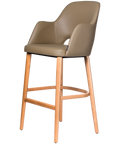 Alfi Bar Stool With Arms With Taupe Vinyl Shell And Trojan Oak Timber Legs, Viewed From Angle In Front