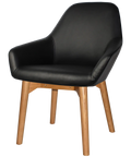 Monte Tub Chair With Light Oak Timber 4 Leg And Black Vinyl Shell, Viewed From Angle In Front