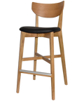 Romano Bar Stool With Black Vinyl Upholstered Seat With Light Oak Timber Frame, Viewed From Angle In Front