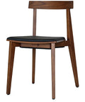 Zoltan Chair With Walnut Stain And Black Vinyl Seat Pad, Viewed From Front Angle